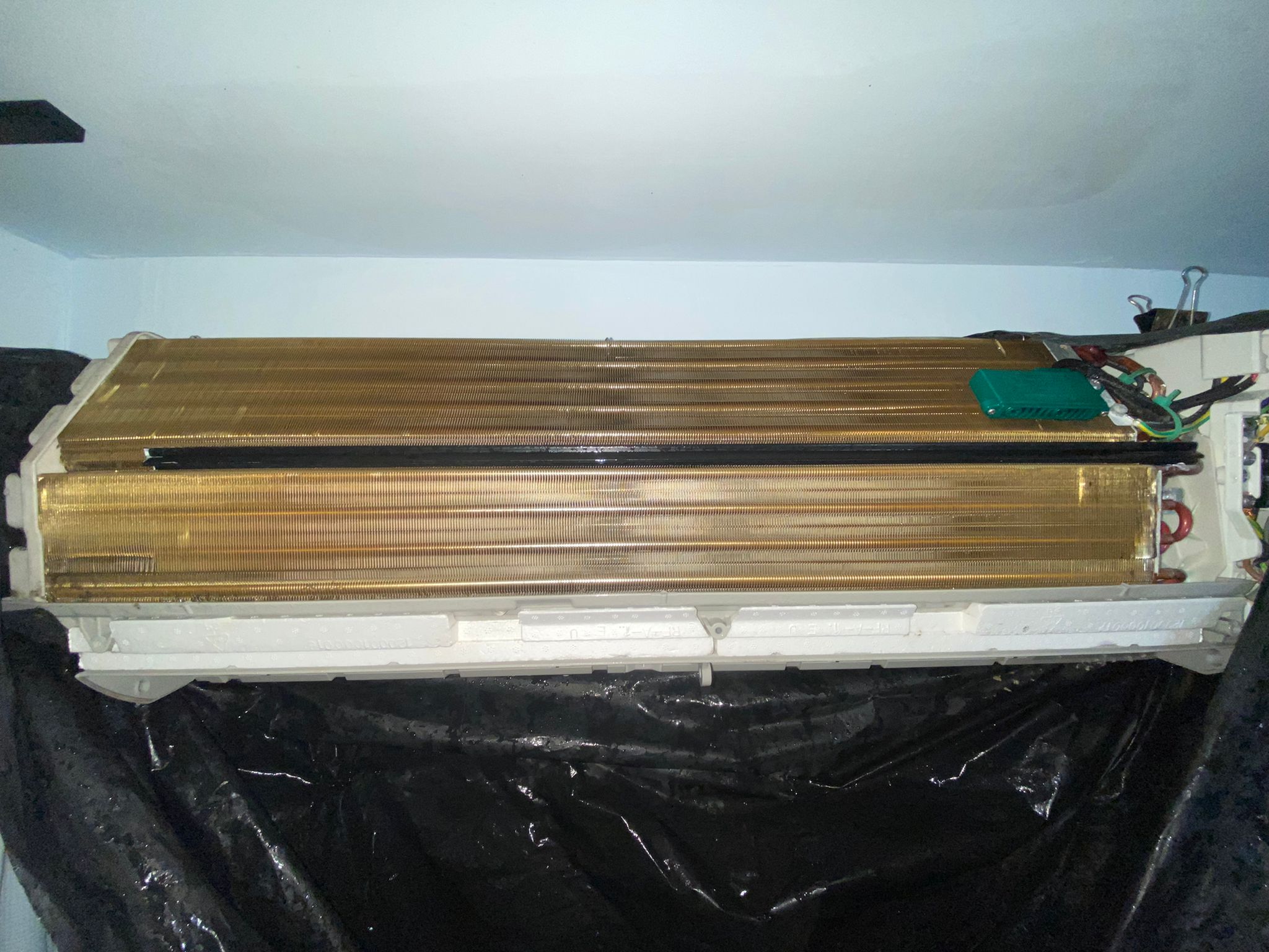 Wall mounted air conditioner cleaning job at a residential unit in