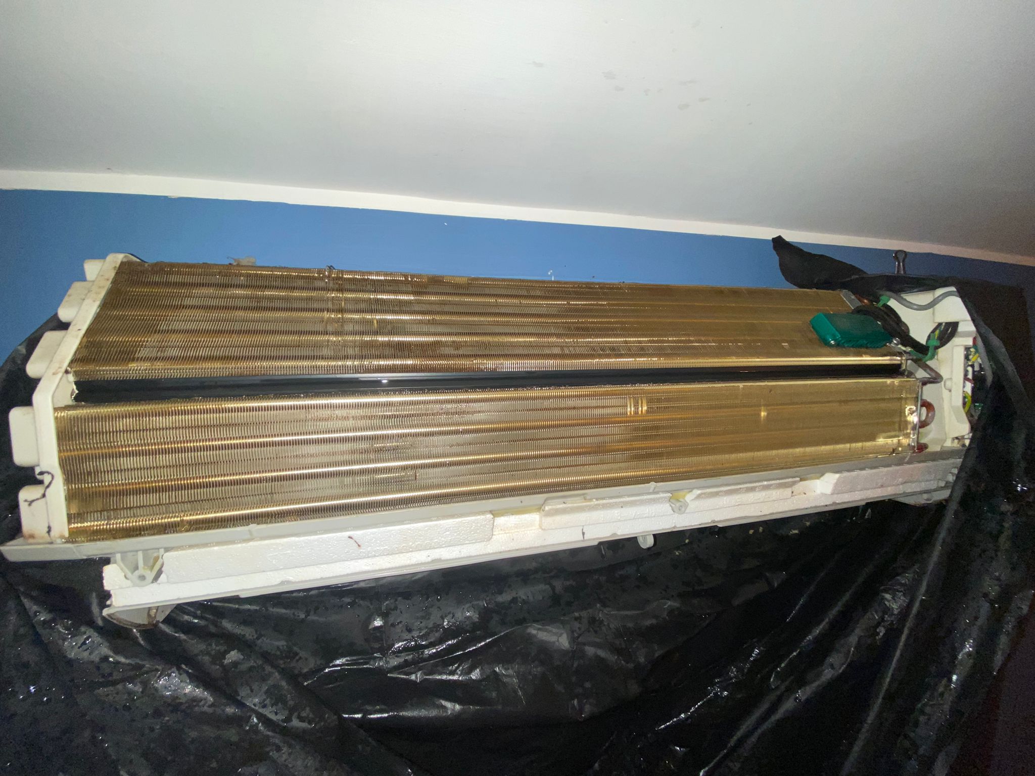 Wall mounted air conditioner cleaning job at a residential unit in